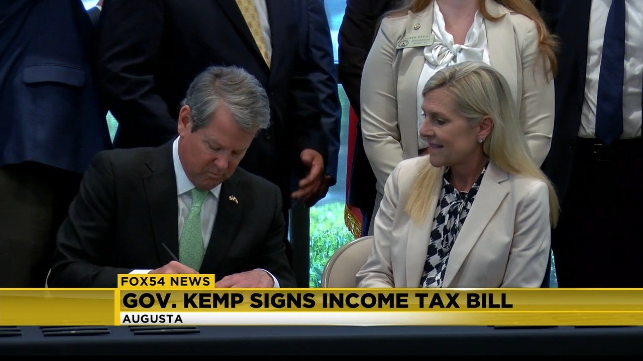 Governor Kemp signs income tax cut bill in Augusta