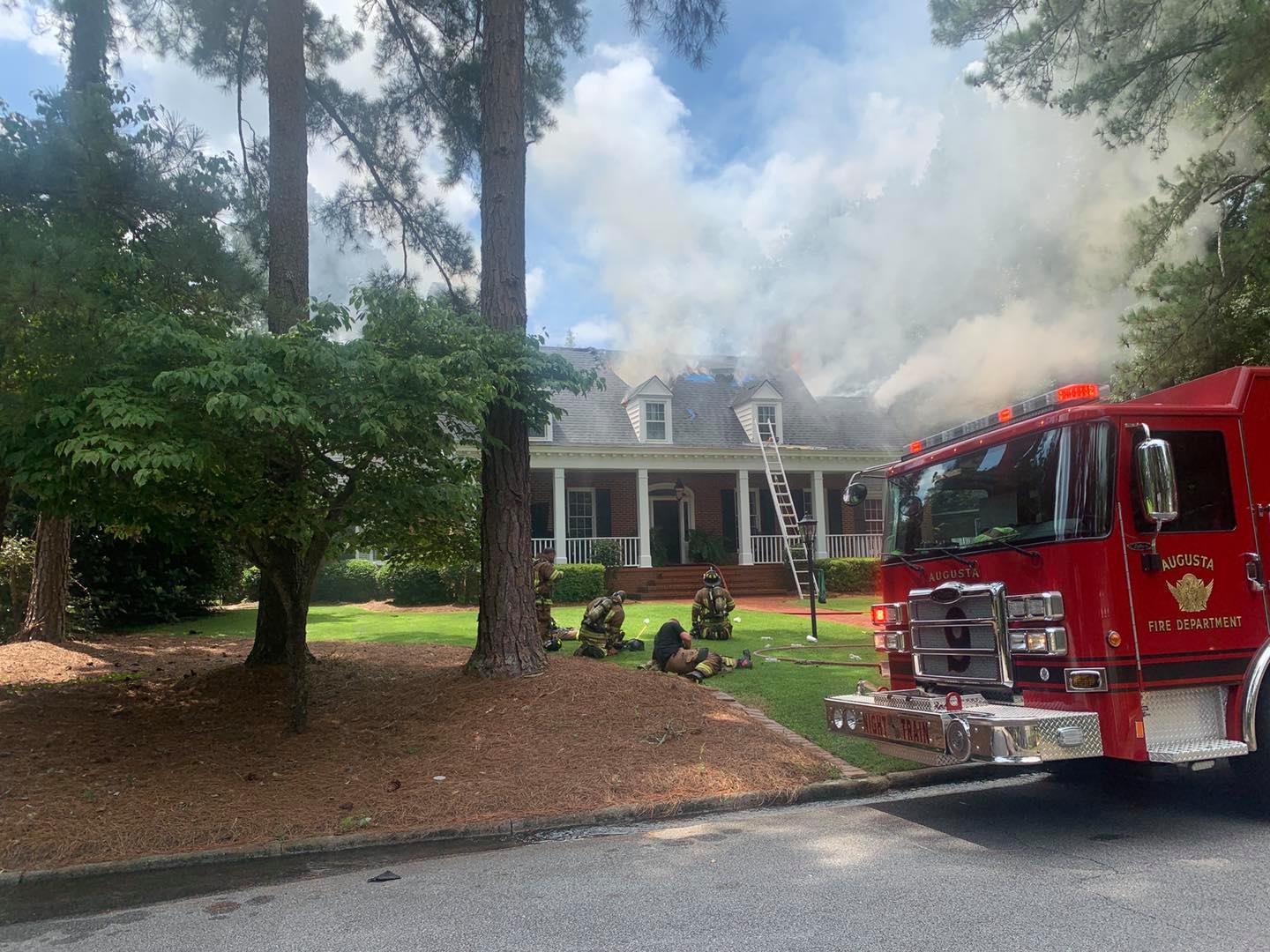 Officials responding to a house fire in Augusta WFXG